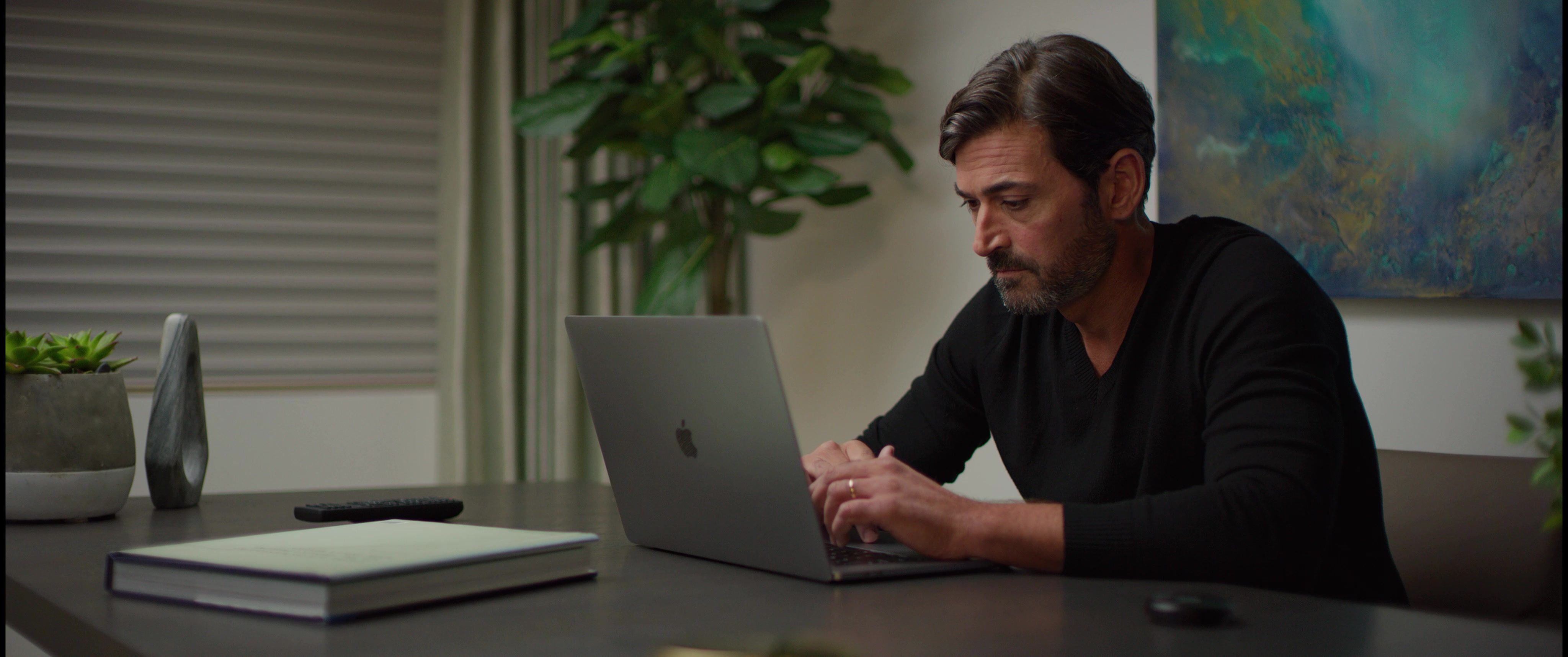man working at desk